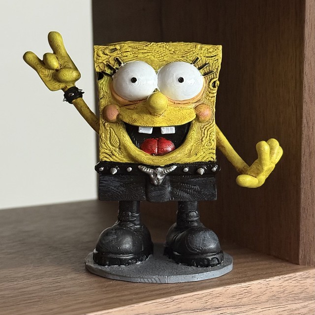 SpongeBob toy. Designed by tattoo artist, Joshua.